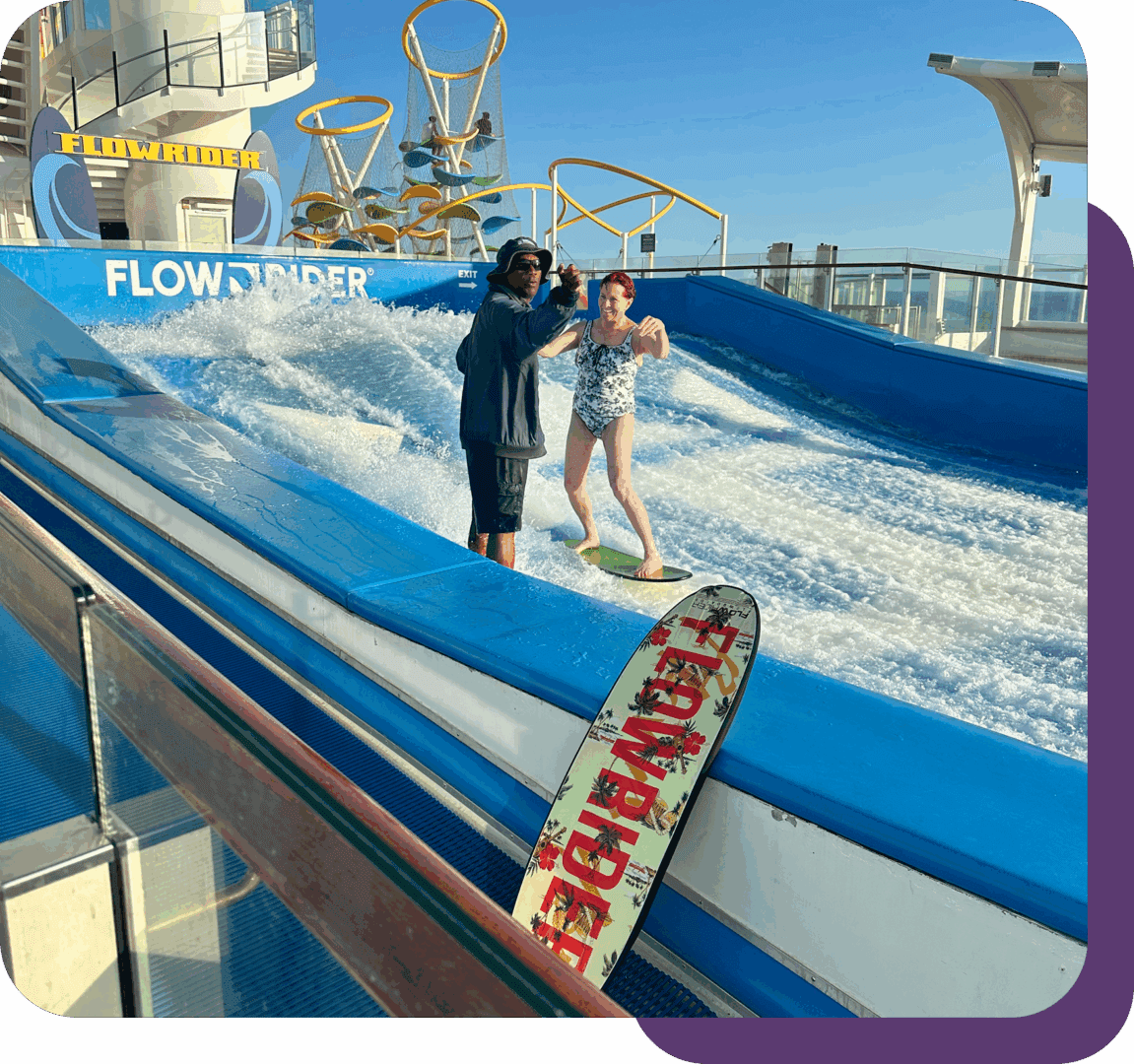 Person surfing on FlowRider wave simulator.